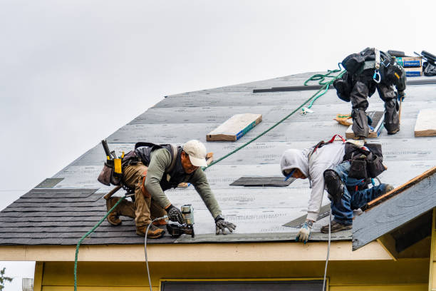 Professional Roofing technician working in Morris, OK